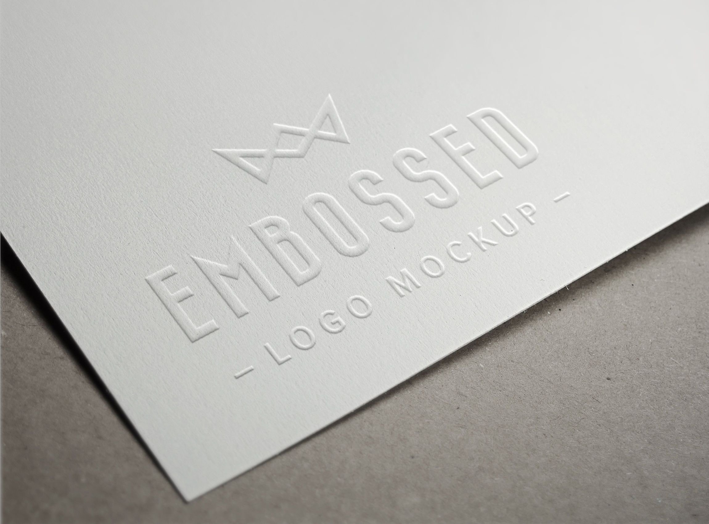 This PSD mock up creates an embossing effect into the
