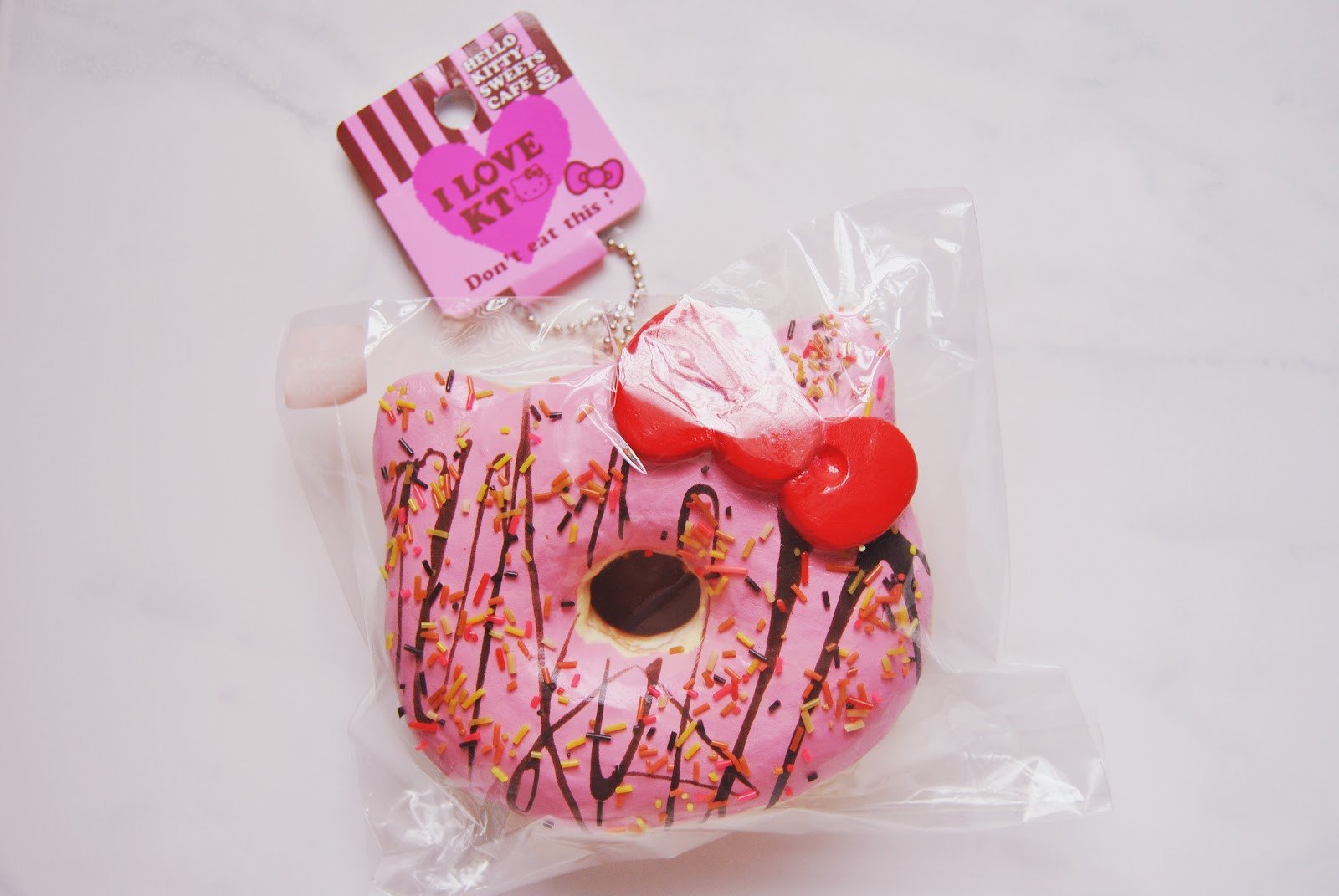 pasteltinted Hello Kitty Donut Squishy Replica