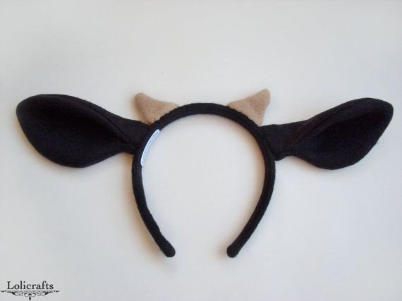 A hand made Black Cow ears headband with two little horns
